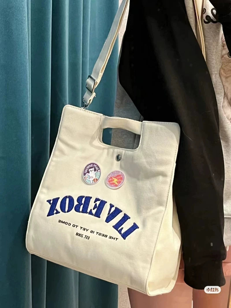 Japanese casual college style commuter Messenger bag female new student class portable single shoulder canvas bag