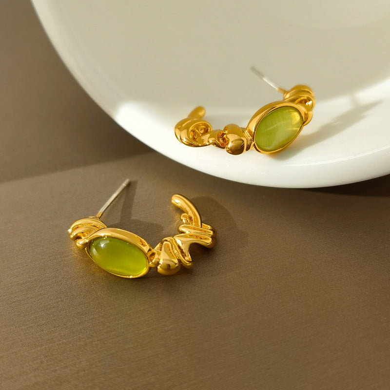 Original design S925 silver needle small fresh green cat's eye C word earrings irregular early spring new earrings 1238