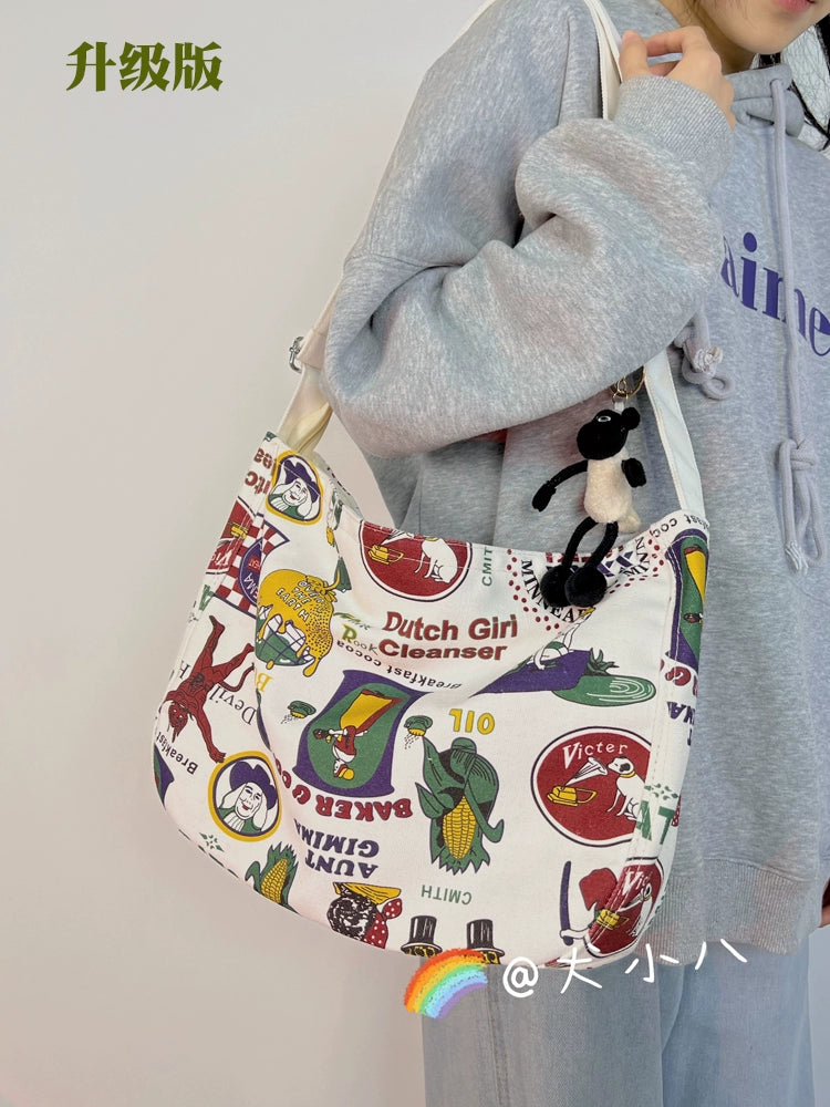 One-shoulder canvas bag women's large-capacity ins Korean style Japanese literature and art summer minority college students commuting Messenger bag