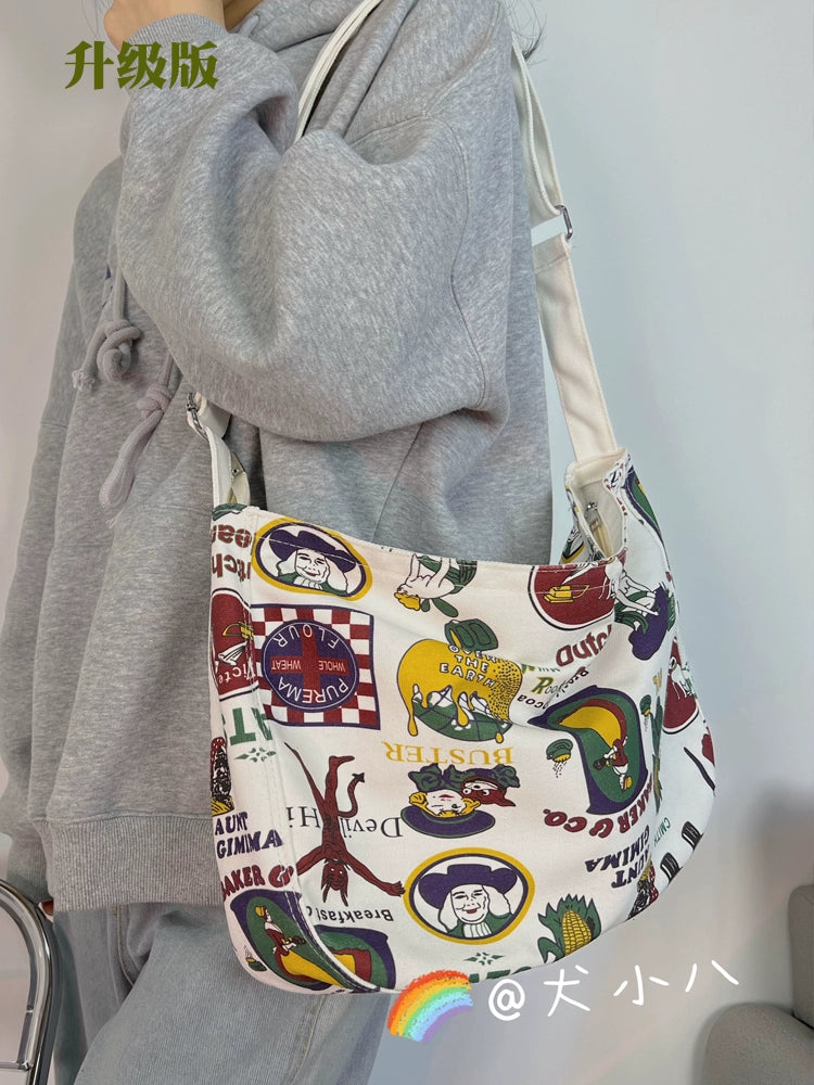 One-shoulder canvas bag women's large-capacity ins Korean style Japanese literature and art summer minority college students commuting Messenger bag