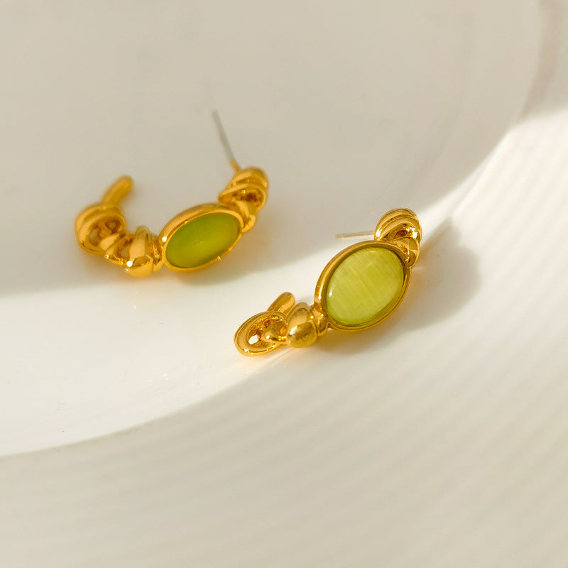 Original design S925 silver needle small fresh green cat's eye C word earrings irregular early spring new earrings 1238