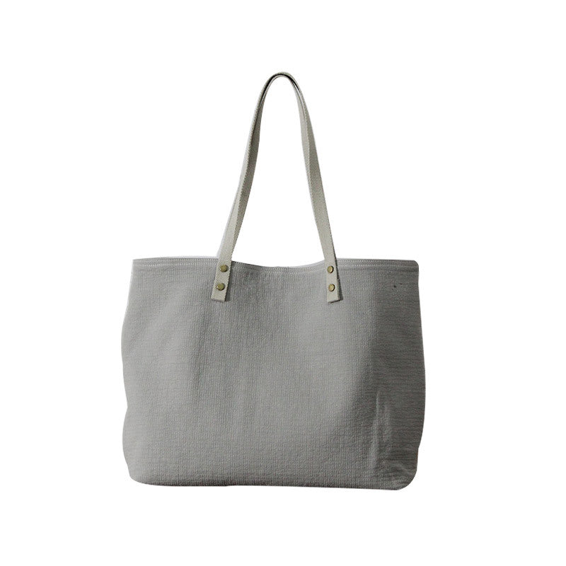 Canvas bag women's niche Japanese cloth bag one-shoulder handbag Korean version all-match large-capacity commuting cotton and linen tote bag