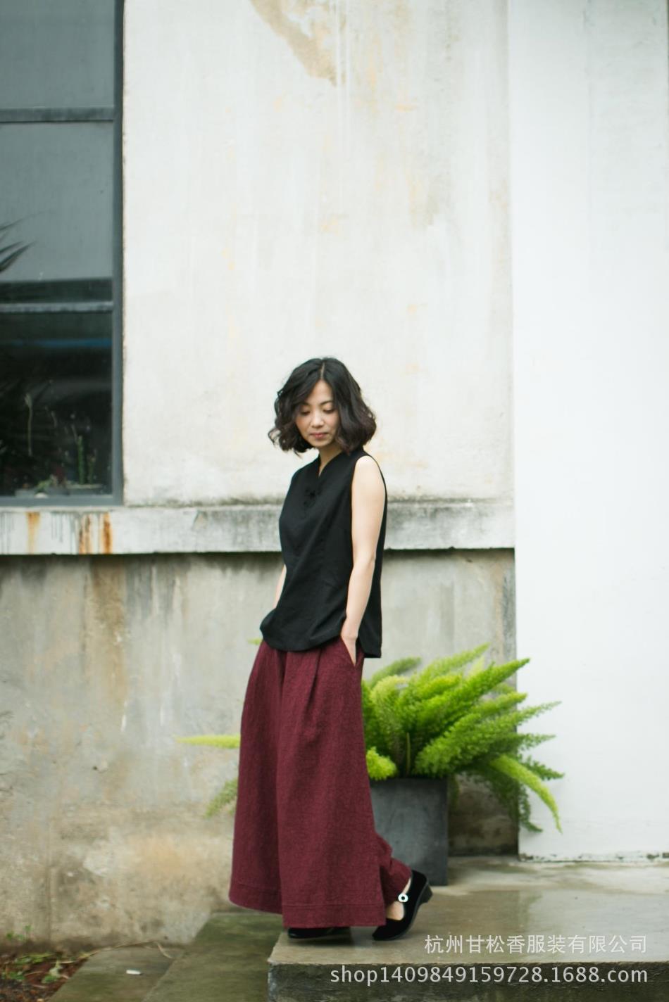 Dazhuo's new product background butterfly button gentle and charming sleeveless shirt