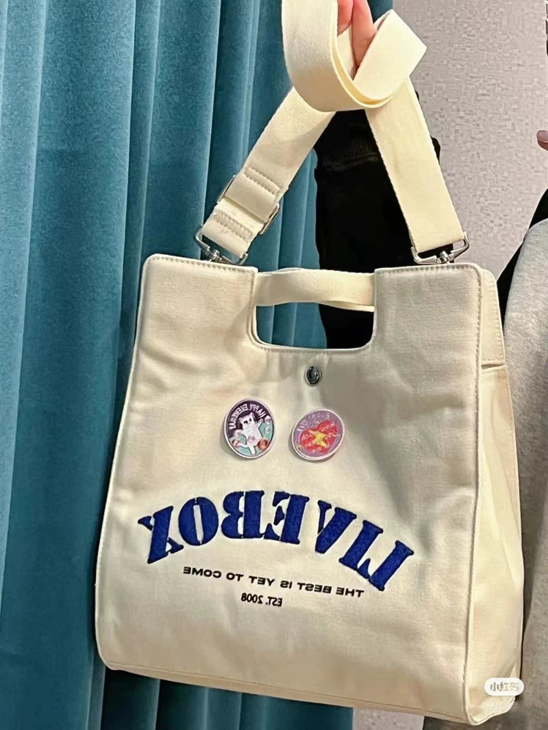 Japanese casual college style commuter Messenger bag female new student class portable single shoulder canvas bag