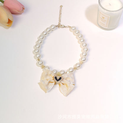 Pet cat devon kitten dog pearl necklace collar small fragrance breeze gemstone bow puppet accessories cross-border