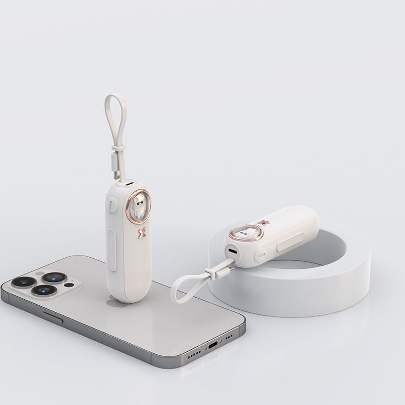 The new cute pet cartoon capsule power bank is small and portable, with its own cable and 5000 mAh power bank