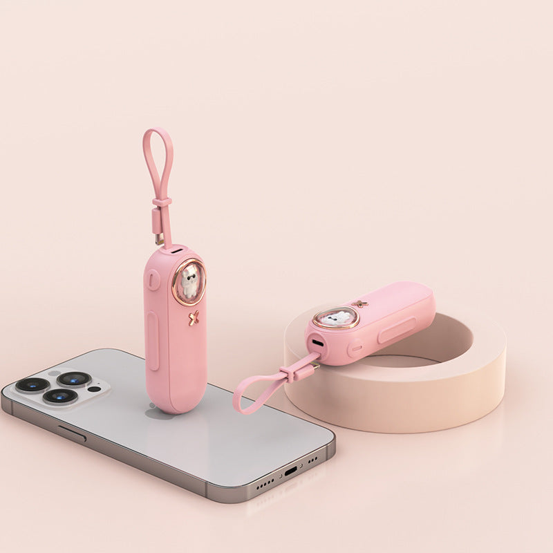 The new cute pet cartoon capsule power bank is small and portable, with its own cable and 5000 mAh power bank