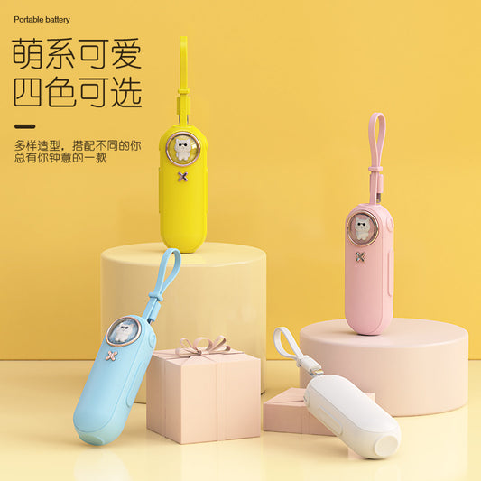 The new cute pet cartoon capsule power bank is small and portable, with its own cable and 5000 mAh power bank