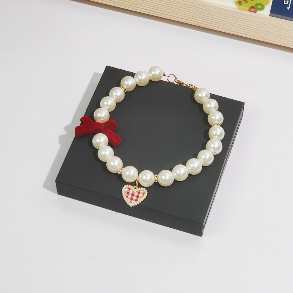 Pet cat devon kitten dog pearl necklace collar small fragrance breeze gemstone bow puppet accessories cross-border