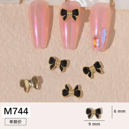 Net red manicure small fragrant wind jewelry love bunny new bow camellia dripping oil nail decoration stickers