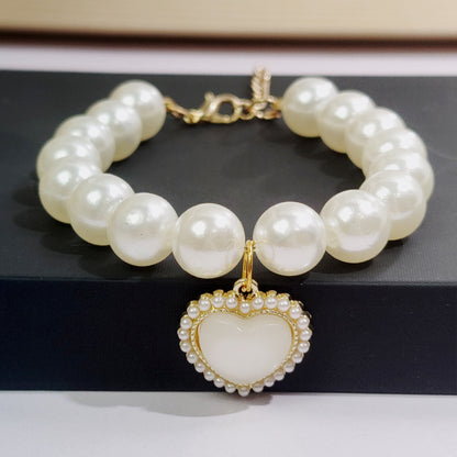 Pet cat devon kitten dog pearl necklace collar small fragrance breeze gemstone bow puppet accessories cross-border