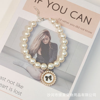 Pet cat devon kitten dog pearl necklace collar small fragrance breeze gemstone bow puppet accessories cross-border