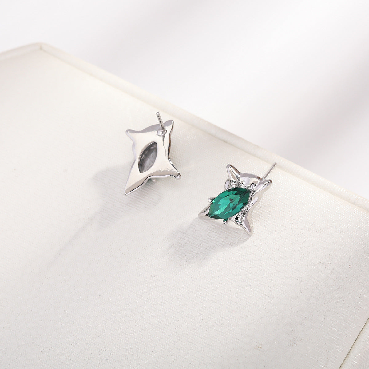 Asymmetric star earrings