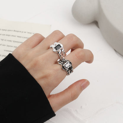 Korean version of ins cold wind personality black irregular texture French lava niche design opening index finger female