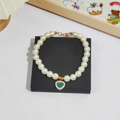 Pet cat devon kitten dog pearl necklace collar small fragrance breeze gemstone bow puppet accessories cross-border