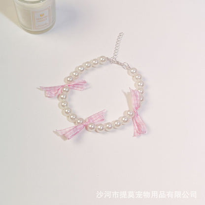 Pet cat devon kitten dog pearl necklace collar small fragrance breeze gemstone bow puppet accessories cross-border