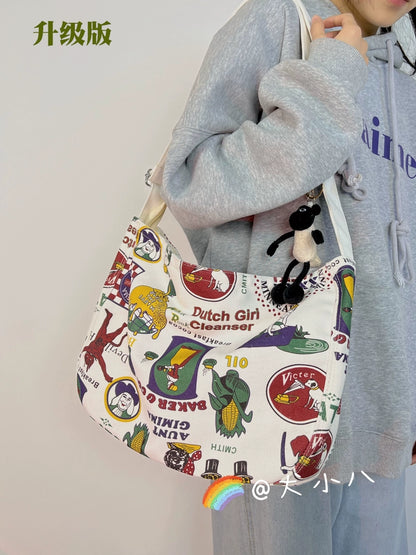 One-shoulder canvas bag women's large-capacity ins Korean style Japanese literature and art summer minority college students commuting Messenger bag