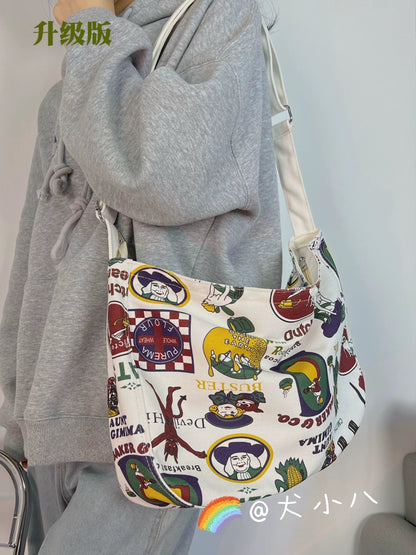 One-shoulder canvas bag women's large-capacity ins Korean style Japanese literature and art summer minority college students commuting Messenger bag