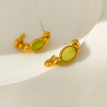Original design S925 silver needle small fresh green cat's eye C word earrings irregular early spring new earrings 1238