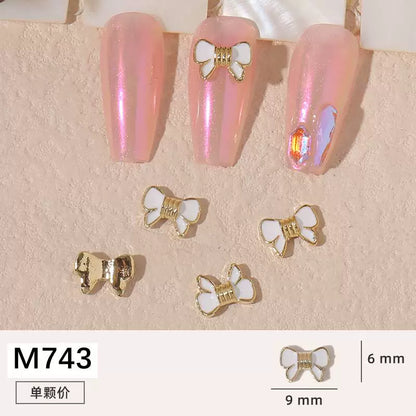 Net red manicure small fragrant wind jewelry love bunny new bow camellia dripping oil nail decoration stickers