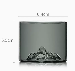 Distant mountain glass tea cup